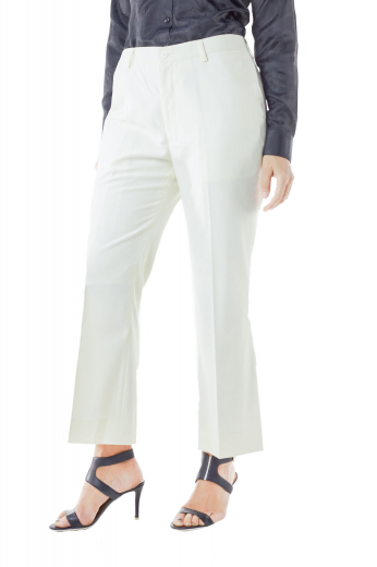 Wrinkle proof white pants flashing two on seam front pockets and hand sewn cuffs and hems. These bespoke polyester pants with snug fit and full length make sizzling office casuals with custom shirts. They incorporate two hook front button and zipper fly for neat front closure.