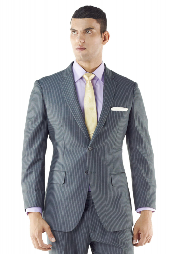 A bespoke men's single breasted slim cut two button suit jacket with made to measure rolled notch lapels, a tailored boutonniere, and tailor made hand molded shoulders.