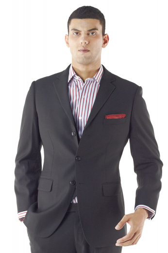 A custom made single-breasted slim cut two-button suit jacket with tailored slim ruled notch lapels, a handmade boutonniere, hand molded shoulders and a made to measure center vent.