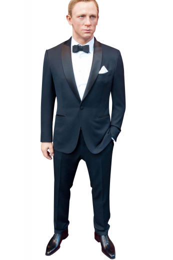 This mens custom made 120s wool black tuxedo - featuring a bespoke slim fit tuxedo jacket and handmade dress pants - is ideal for weddings and formal events. The mens custom made jacket has a shawl collar with 3-inch-wide satin-facing lapels, 1 angled upper welt pocket, 2 double piped lower pockets, hand moulded shoulders, and 1 front close button. The mens bespoke slim fit tuxedo pants have hand sewn cuff hems at the bottom, satin piping on the side seam, 2 front slash pockets, a 2 point button and hook closure, and a zip fly.