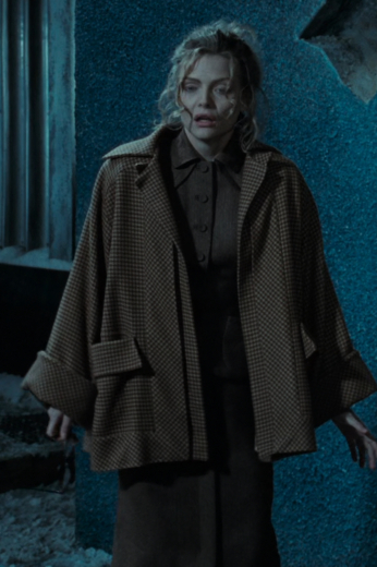 : Batman Returns features some of the most iconic movie looks worn by the iconic Michelle Pfeiffer, including this oversized coat for sale now. This tailored woman’s coat is a must have Hollywood fashion item.