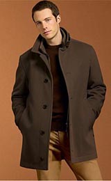 Collared five spaced button with last button on the hem trimmed with slanted double piped lower pockets in this casual below hip length car coat